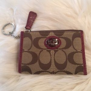 Coach wallet with key chain.
